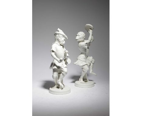 A PAIR OF ITALIAN CERAMIC MONKEY BAND FIGURESBY MOTTAHEDEH, MODERN40.8cm high (max) (2) To be sold without reserve. Provenanc