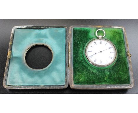 Wagner &amp; Gerstley Ltd. A silver mounted travelling clock, Birmingham 1904, 9cm x 8cm, includes white metal cased pocket w