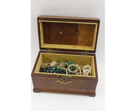 A 19th century mahogany box, contains items of costume jewellery including a cultural pearl necklace, a malachite bead neckla