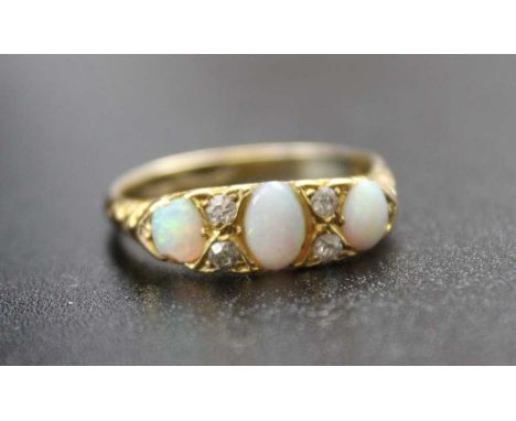 An 18CT gold opal and diamond set ring Q.5 size&nbsp;