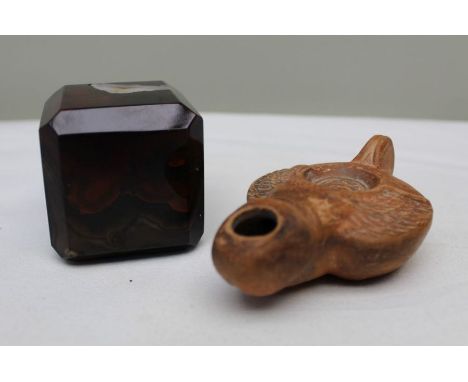 An onyx cube and phallus Roman oil lamp