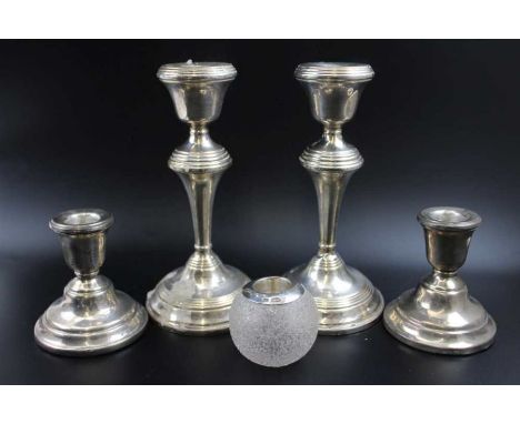 Broadway &amp; Co. A pair of silver candlesticks, with ring turned decoration, 17cm high, Birmingham 1964, together with a pa