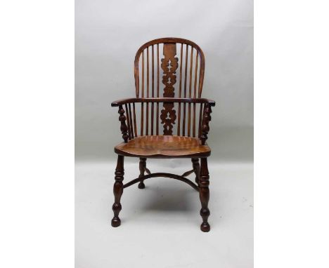 A 19th century provincial hoop stick &amp; pierced splat back, open armchair, yew wood with an elm seat, and crinoline stretc