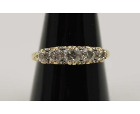 An 18ct gold ring set five graduated brilliant cut diamonds, gross weight: 3.6g, ring size: Q