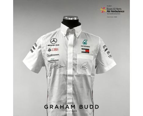 Lewis Hamilton and Valtteri Bottas signed white Mercedes Petronas F1 Tommy Hilfiger shirt,&nbsp;circa 2021
short-sleeve butto