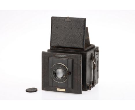 A Jas. Lancaster &amp; Son Planoreflex SLR Camera, black, body G, some areas of wear throughout, ground glass G, focal plane 