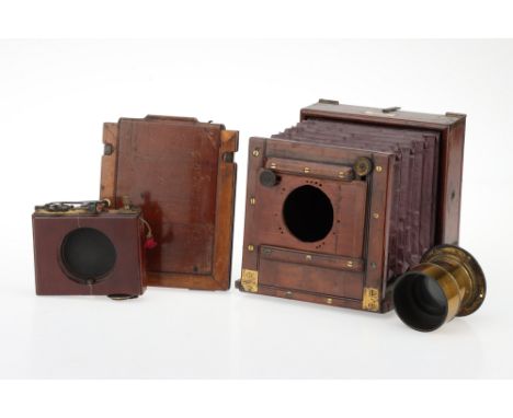 A J.H. Dallmeyer Quarter Plate Tailboard Camera pre-1892, wine-red square bellows, single extension, with a Dallmeyer brass l