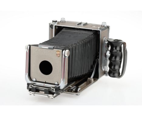 A Linhof Super Technika 5 x 4in Model IV Technical Camera Body 1956-63, serial no.68524, body G, bellows appear OK, with 150m