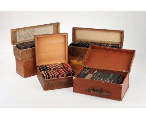 A Large Collection of Magic Lantern Slides, comprising of 5 pine cases and a leather case containing a collection of mixed ma