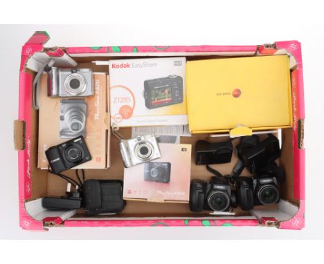 A Collection of Compact and Bridge Digital Cameras including a Canon PowerShot A560, a A620 and a A1300 all power up and take