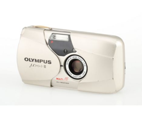 An Olympus MJU 35mm Compact Camera, champagne, body G, some paint wear, shutter &amp; flash working at the time of the auctio