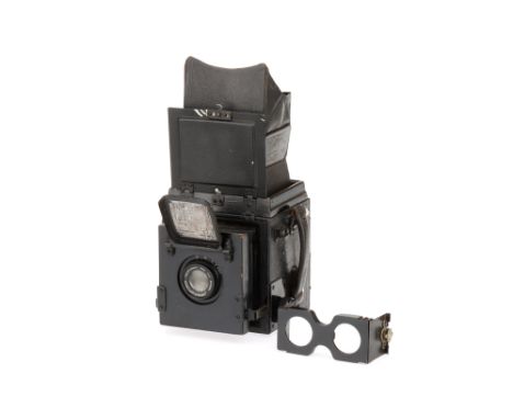 A Thornton Pickard Ruby Horizontal SLR Camera, 1923, black, for 3½ x 2½ plates, body G-VG, shutter working at time of auction