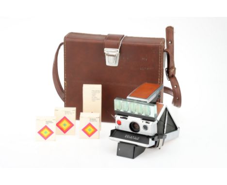 A Polaroid SX-70 Land Camera Outfit, chrome, body G-VG, untested with film, optics G, some dust present, together with a Pola