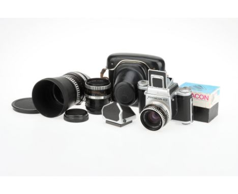 A Pentacon Six Medium Format SLR Camera Outfit, chrome, body G-VG, shutter fires but speeds incorrect, the second curtain may