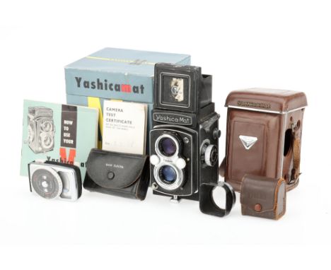 A Yashica-Mat Medium Format TLR Camera black, 1957-71, serial no.MT2030856, with a Yashinon f/3.5 80mm lens, shutter fires bu