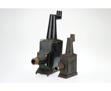 2 Phantasmagoria-Type Magic Lanterns including a large tinplate magic lantern with a brass lans, 64cm tall and a smaller lant