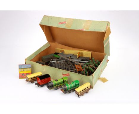 Clockwork Chad Valley Train Set including 2 clockwork engines, rolling stock, track and station
