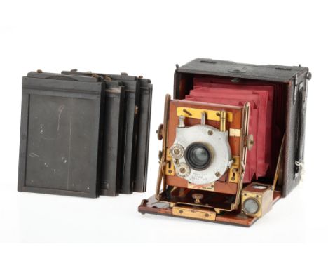 A Sanderson Quarter Plate Hand &amp; Stand Camera, body G-VG, bellows G with some wear, ground glass VG, together with a C. P