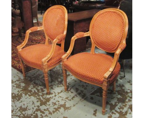 FAUTEUILS, a pair, Louis XVI style, beech frames and coral patterned upholstery on fluted, turned supports, 60.5cm W. (2)