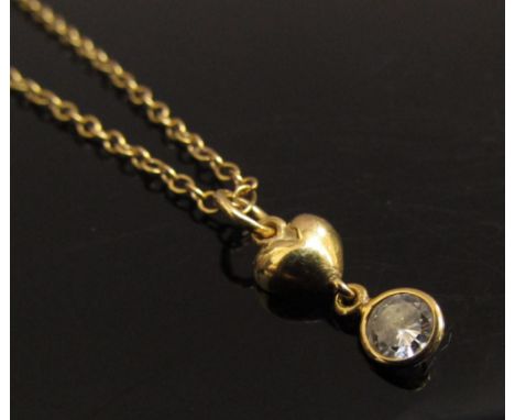 An 18ct gold chain, 48cm long, hung with a diamond and heart drop, 0.25ct approx, 3.6g 