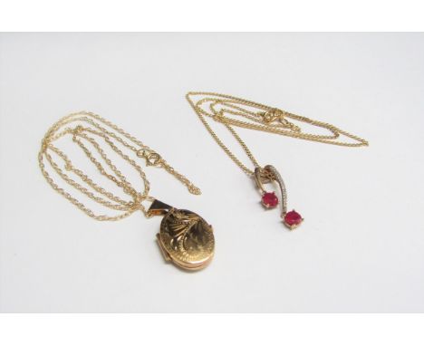 A diamond and ruby pendant hung on chain stamped 375, 44cm long and a 9ct gold engraved locket on chain stamped 375, 46cm lon