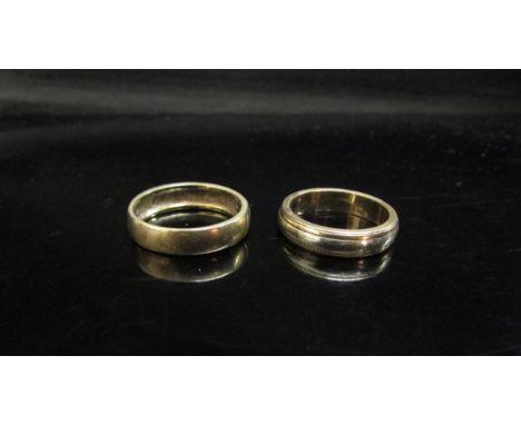 Two 9ct gold bands. Sizes J and K/L, 6.7g 