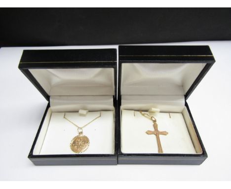 A gold St Christopher hung on chain stamped 375, 46cm long and a cross pendant hung on 9ct gold chain, 46cm long, 3.4g 