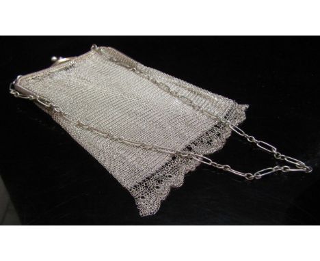 A fine chain purse stamped sterling (some damage) 