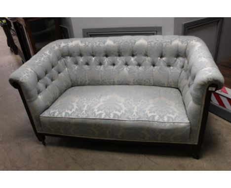 Edwardian settee with deep buttoned back upholstered in light blue and silver, height 70 cm, width 135 cm, depth 68 cm