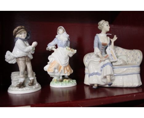 A Royal Worcester figurine Rosie Picking apple, Coalport figurine The Boy, and a Tengra figurine of a Lady on a Settee 