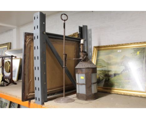 A 19th century candle lantern and candle stick