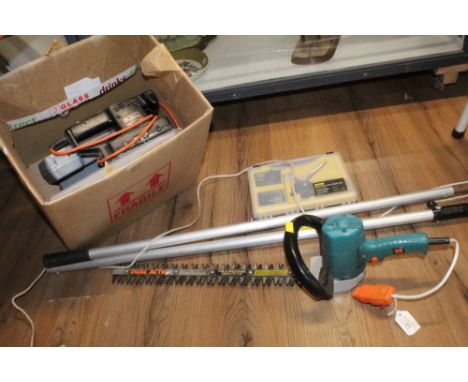 A long handled prunes, hedge cutter and box of hand tools and electric sander