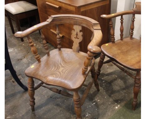 An elm smokers bow chair, 74 cm high x 67 cm wide x 48 cm deep