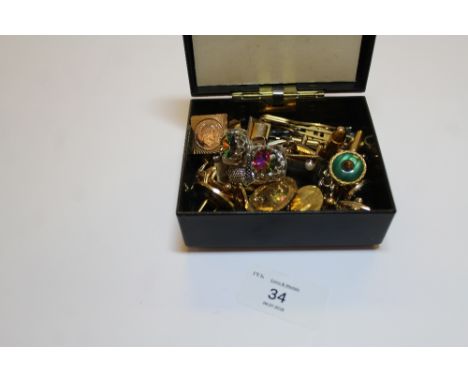 Assorted cufflinks and tie clips