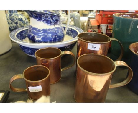 Set of 4 vintage copper measuring jugs, 2 pints - 1/2 pint