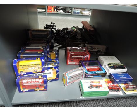 A shelf of 1970's and later Corgi die-cast Buses including 471 Silver Jubilee, Corgitronics, Origina Omnibus, Hamleys etc, al