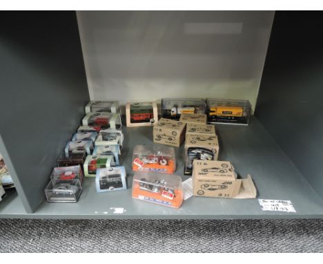 A shelf of modern die-casts including Oxford, Shell 007, Guitoy, Schuco etc, all boxed, approx 20+