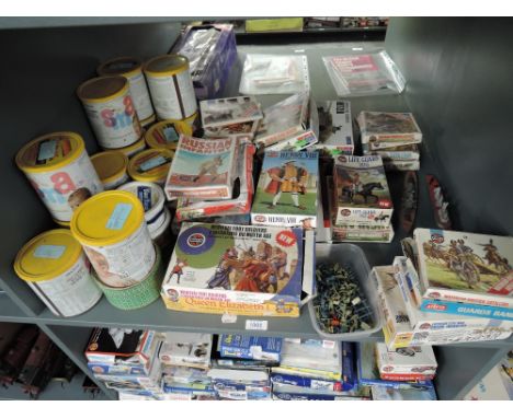 A shelf of Military and Medieval plastic kits, mainly figures and on horseback, Airfix, ESCI and similar, loose and in origin