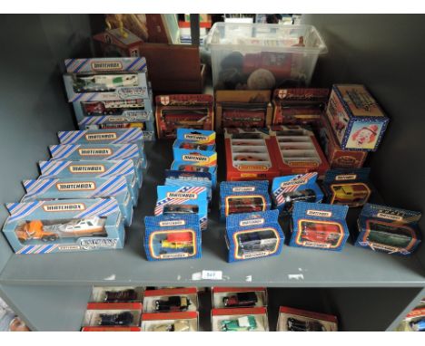 A shelf of Matchbox die-casts including Convoy x 8, 1981 Mini Ha Ha x2, 1990's and later, approx 24, all boxed