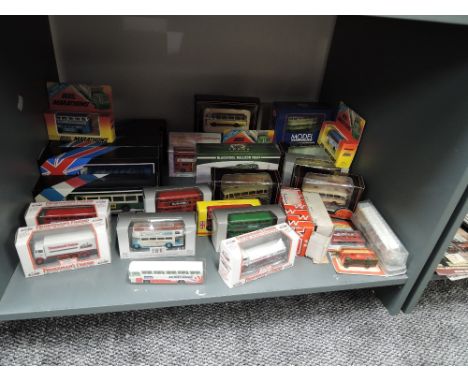 A shelf of modern die-casts including Solido, ERF, Lledo Buses and Wagons, all boxed, approx 25+