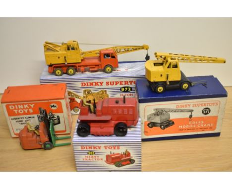 Three Dinky Super Toys Die-casts, 571 Coles Mobile Crane, 972 20-Ton Lorry Mounted Crane, Coles and 963 Heavy Tractor, all in