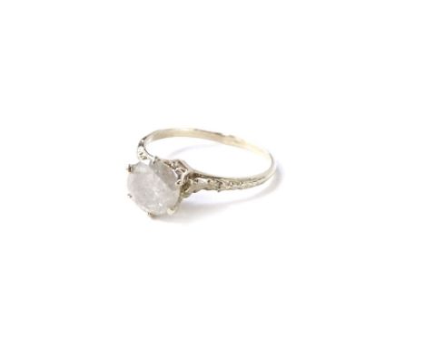 A diamond solitaire ring, with round brilliant cut diamond, approx 1.22cts, in white claw setting, with white shank and leaf 