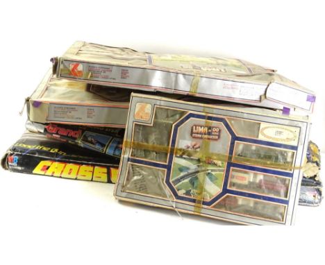 A Lima trainset, an Action GT stock car racing game, etc. (AF).