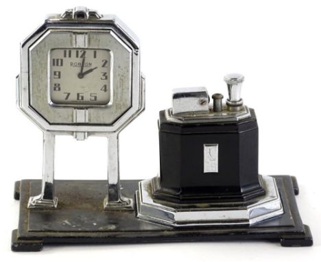 A Ronson Touch Tip table lighter, with chrome plated pull wind clock, on goal-post legs, and removable octette lighter, the b