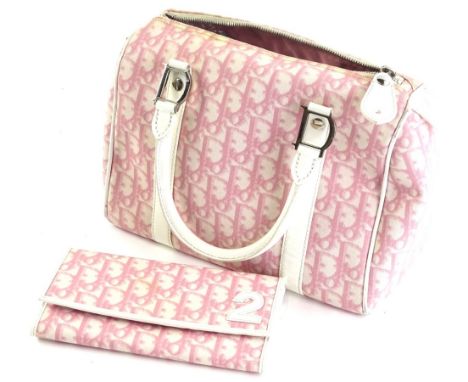 A Christian Dior Boston handbag, in pink monogrammed canvas, with white patent leather handles, padlock and two keys, 20cm H,