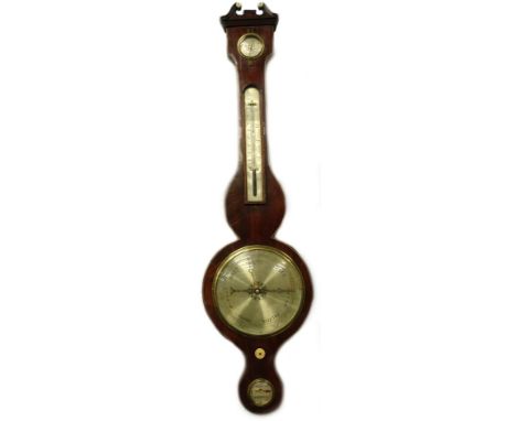 A mid 19thC mahogany and boxwood strung wheel barometer, by Salkind of Norwich, with dry damp gage thermometer, engraved silv