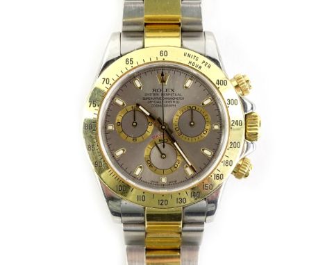 A gentleman's bi-colour stainless steel Rolex Daytona 116523 cosmograph wristwatch, stamped to the silvered dial, Rolex Oyste