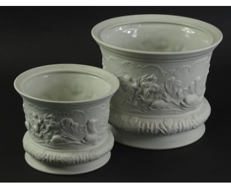 A Portmeirion English Heritage collection white bisque and glazed jardiniere, 23cm dia, and a smaller example 17cm dia.