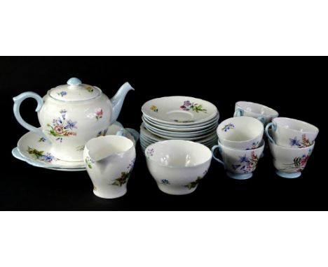 A Shelley Wild Flowers pattern part tea service, to include teapot cover, two sandwich plates, side plates, milk jug, sugar b