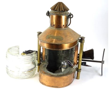 A railway copper and brass top light, (AF), and a wrought iron companion set.